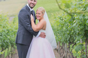 Husband and Wife in the vineyard at Wild Dog Winery © Erika's Way Photography