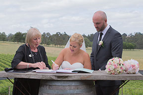 Signing the final papers. Husband and Wife at Wild Dog Winery Melbourne © Erika's Way Photography