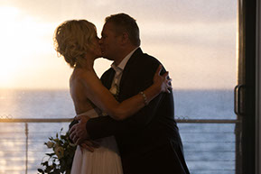 Bride and Groom first Kiss at Safety Beach Sailing Club Wedding Venue, Mornington Peninsula, Vic. © Erika's Way Photography