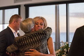 Th ebride hugging her mother-in-law at Safety Beach, Mornington Peninsula, Vic. © Erika's Way Photography