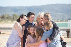 Family hug at Safety Beach, Mornington Peninsula, Vic. © Erika's Way Photography