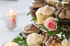 Wedding cupcake cake, flowers and candles detail © Erika's Way Photography